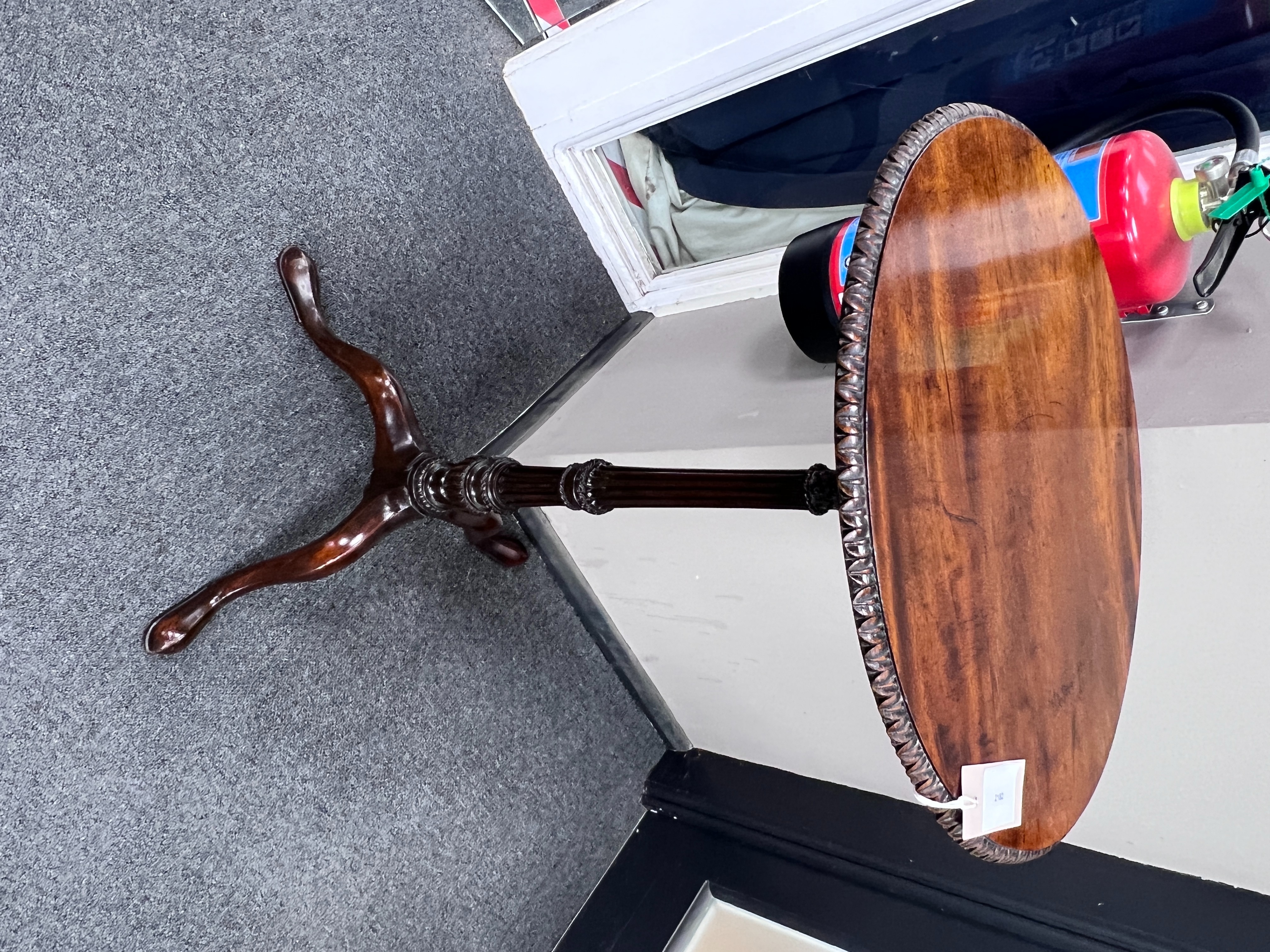 A George III style mahogany torchere